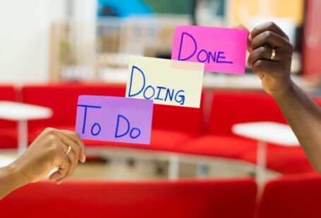 Project Management - person holding purple and white card