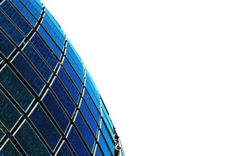 Choosing Panels - blue and black glass building