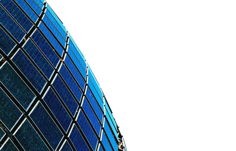 Choosing Panels - blue and black glass building