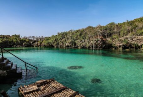 Sumba Solar - brown wooden dock on body of water during daytime