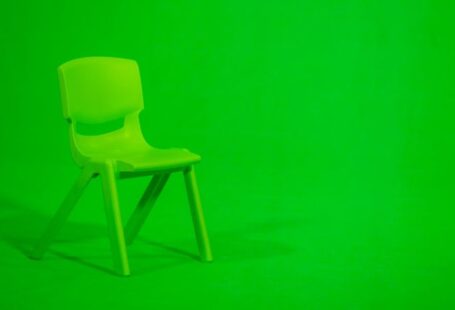 Kalimantan Green - green plastic chair on green floor