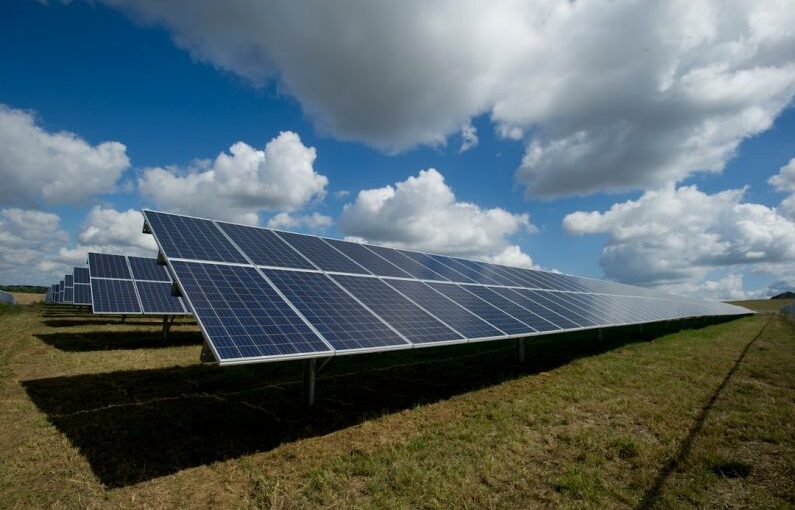 Panel Efficiency - solar panels on green field