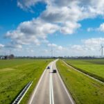 Solar Transport - green grass field under blue sky during daytime