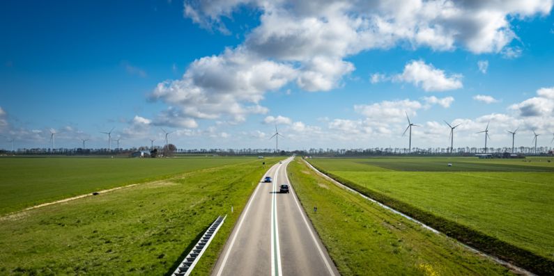 Solar Transport - green grass field under blue sky during daytime