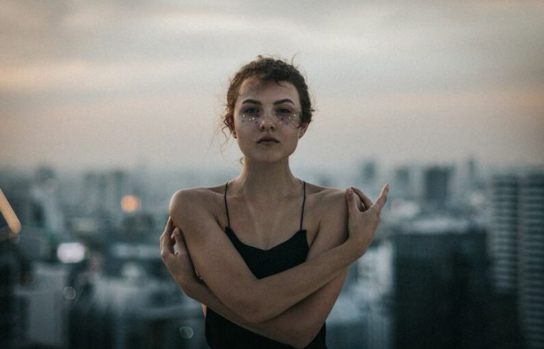 Rooftop Trend - woman wearing black spaghetti strap sleeveless top