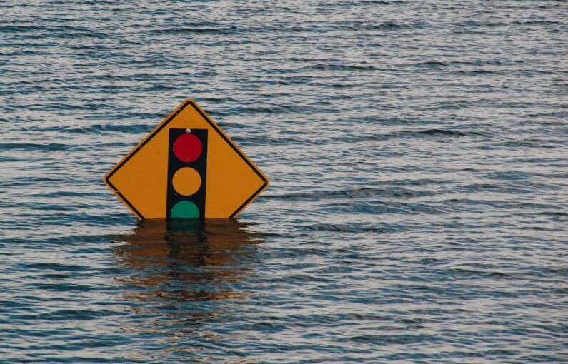 Disaster Recovery - traffic light sign underwater