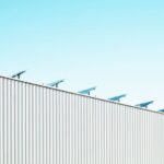 Startups Solar - parabolic antenna on white roof